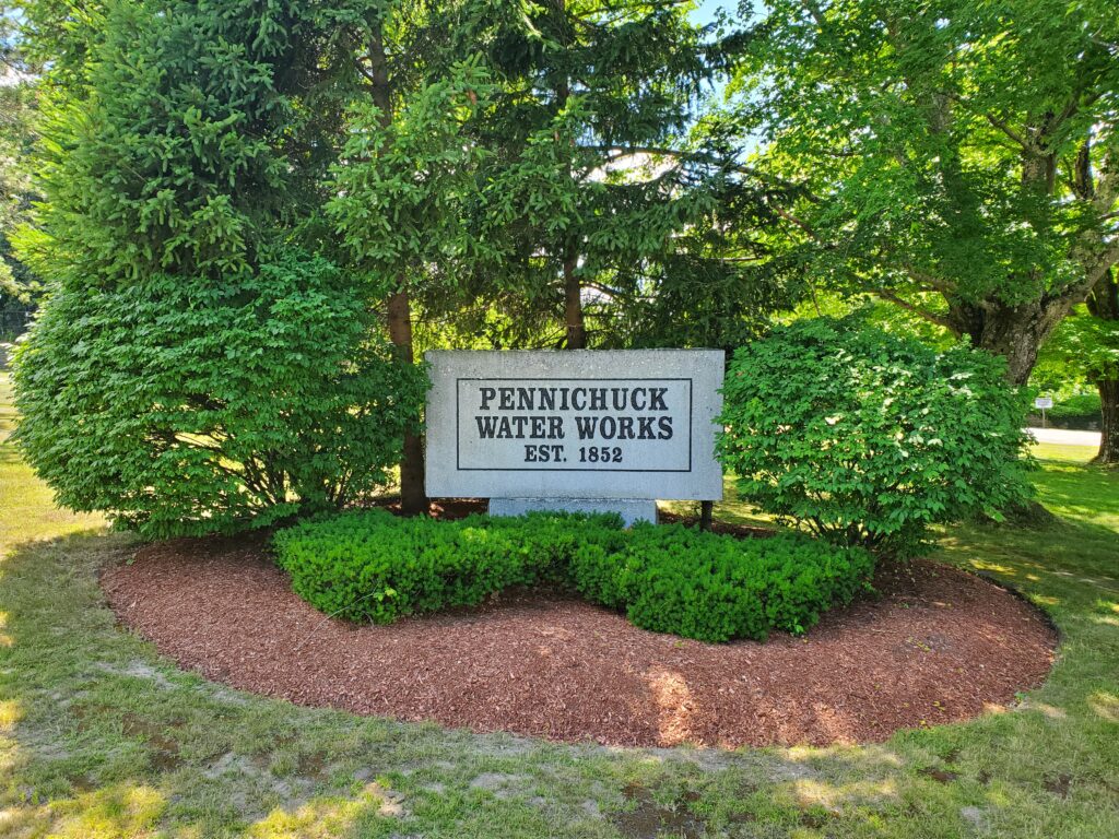 Concrete sign that says Pennichuck Water Works